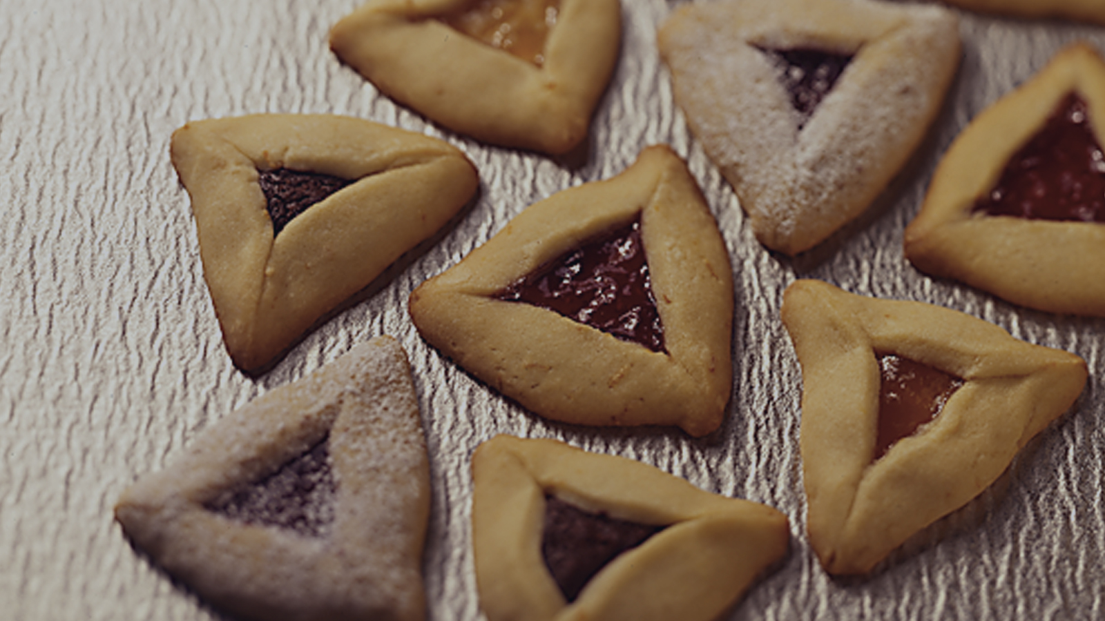 Hamantashen cookies on a baking sheet